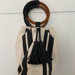 Celine Dion cream and black striped canvas purse with wooden handles